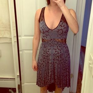 Patterned high low dress with lace accents